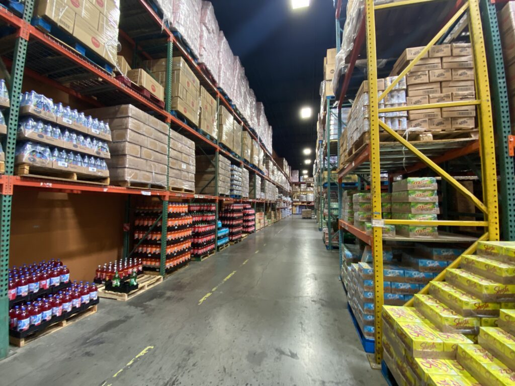 Warehouse aisle with beverages and snacks